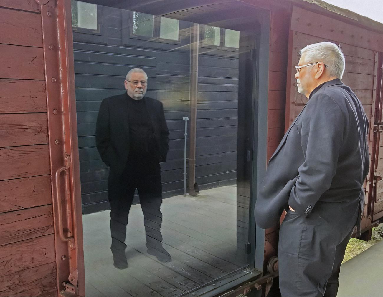 Edwin at the boxcar display at the memorial 